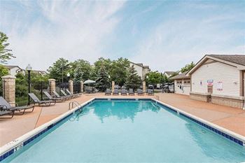 Sparkling swimming pool with sundeck
